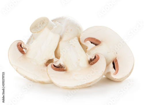 Fresh mushrooms champignon and half isolated on white background with clipping path
