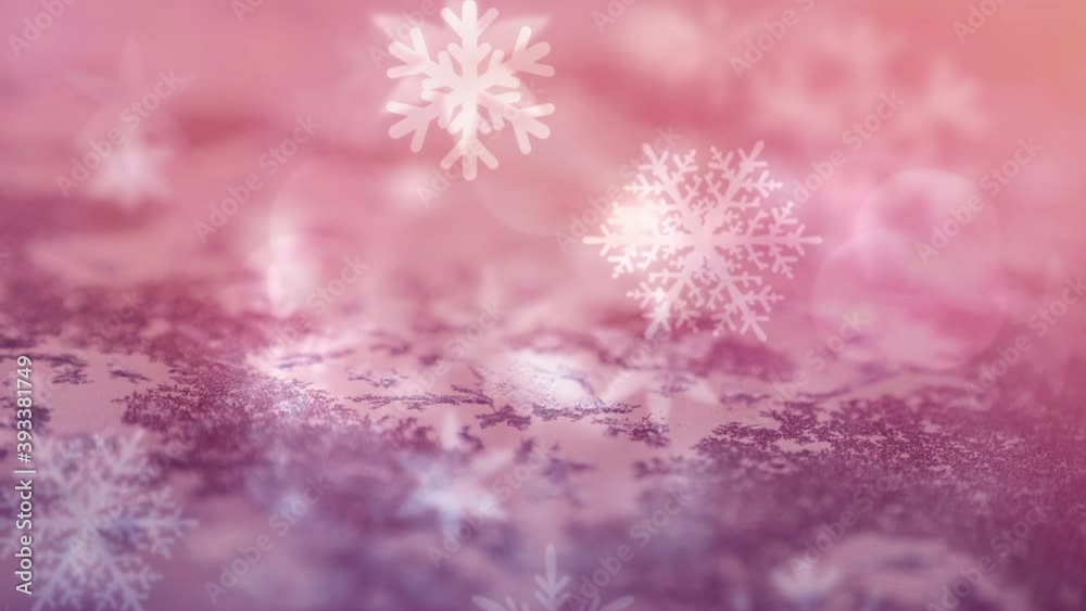 Animation of multiple snowflakes falling over pink surface Animation of multiple snowflakes falling over pink surface