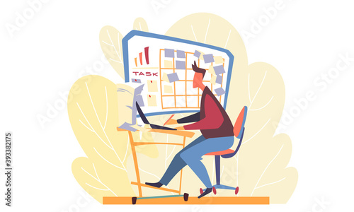 A man working at a laptop and looking at a board with stickers and assignments over his desk. The background depicts yellow leaves and bushes. Working day of a young man in a business office