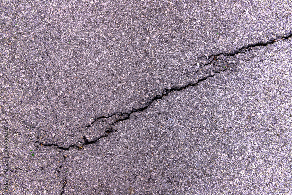 Obraz premium Close-up concrete asphalt exterior cracked seamless patterned texture