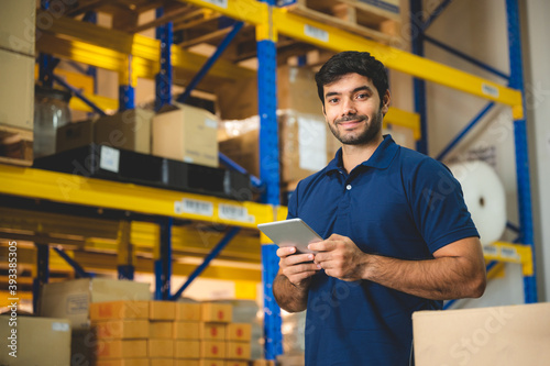 industrial occupation man person working in storage warehouse, business male portrait in logistic storehouse factory for a job of goods box shipping, stock delivery distribution industry to global photo