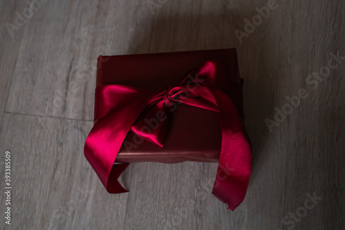 Christmas gift on wooden background