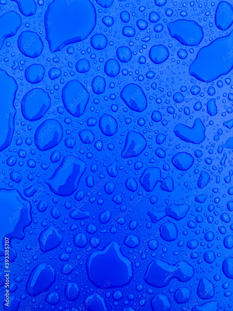 water drops on blue plastic background image water drops on blue plastic background image