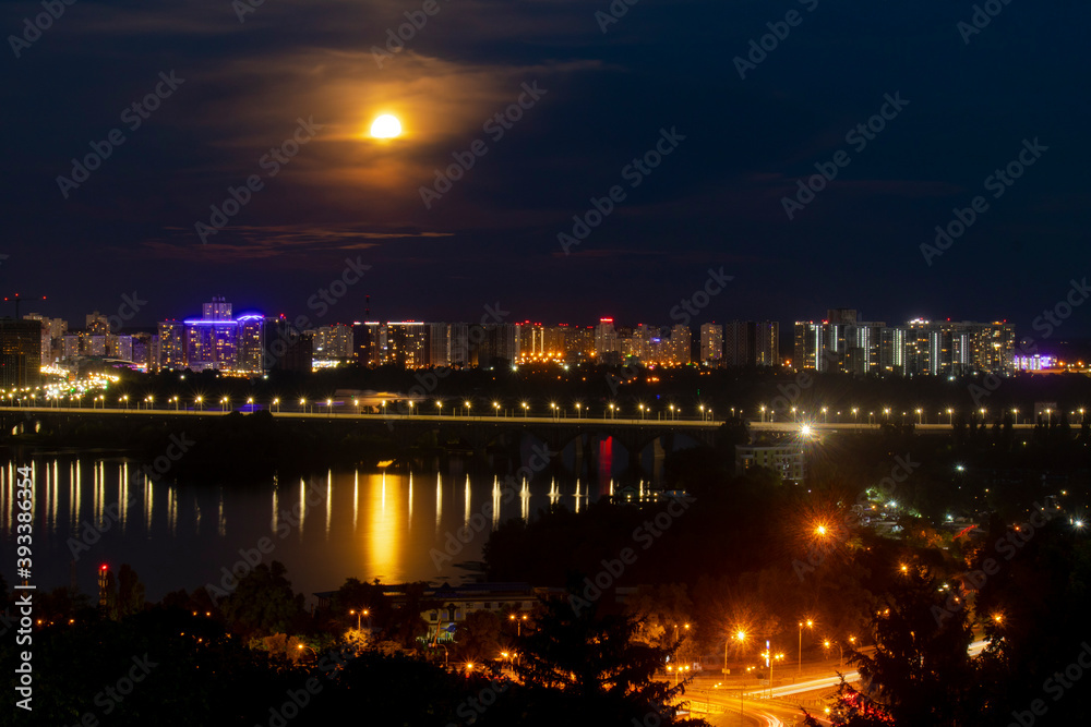 Evening view of Kiev, Ukraine, a view of the Paton Bridge and the left bank.