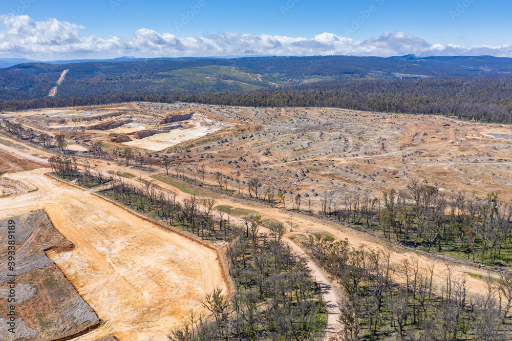 Aerial view of forest regeneration and a quarry in regional Australia