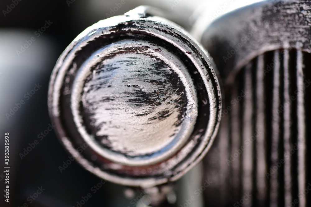 Detailaufnahme Scheinwerfer, Metall Oltimer, Modell-Auto aus Blech Detailaufnahme Scheinwerfer, Metall Oltimer, Modell-Auto aus Blech