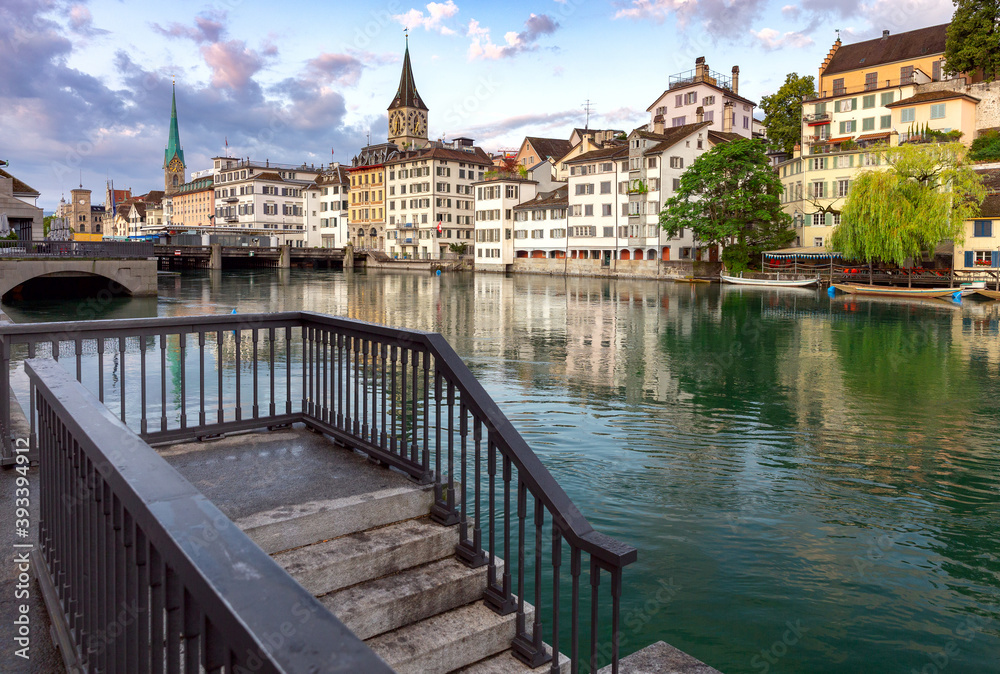 Zurich. Old city embankment and medieval houses at dawn.