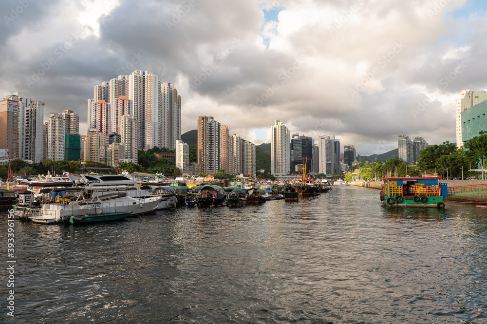 Fototapeta premium Aberdeen Harbour seen from Ap Lei Chau Bridge, In this area you will find fishing boats, houseboats, and sampans, The bay between the south coast of Hong Kong Island