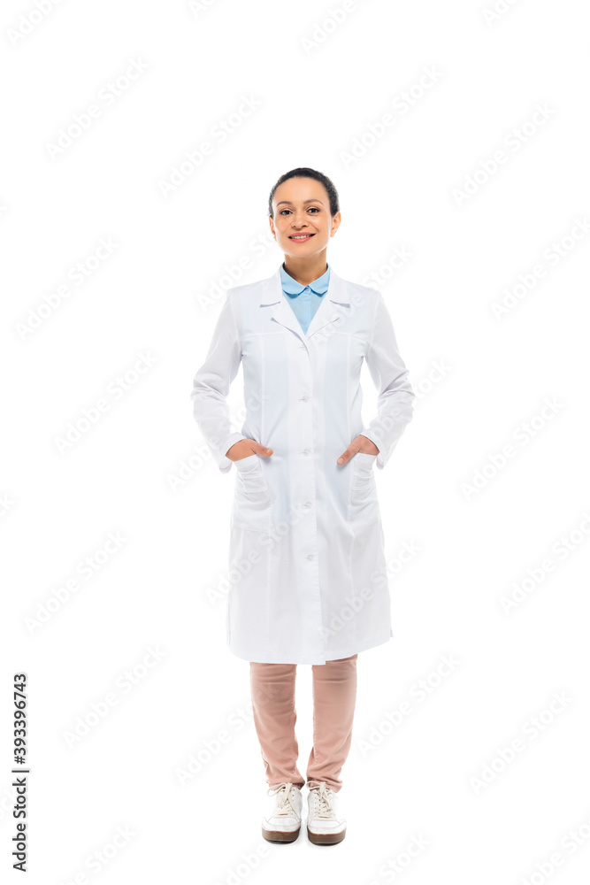 Smiling african american doctor in white coat looking at camera isolated on white Smiling african american doctor in white coat looking at camera isolated on white