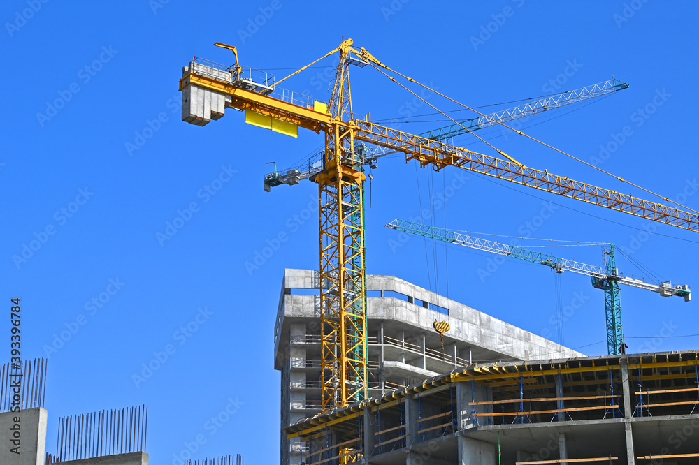 Crane and highrise construction site