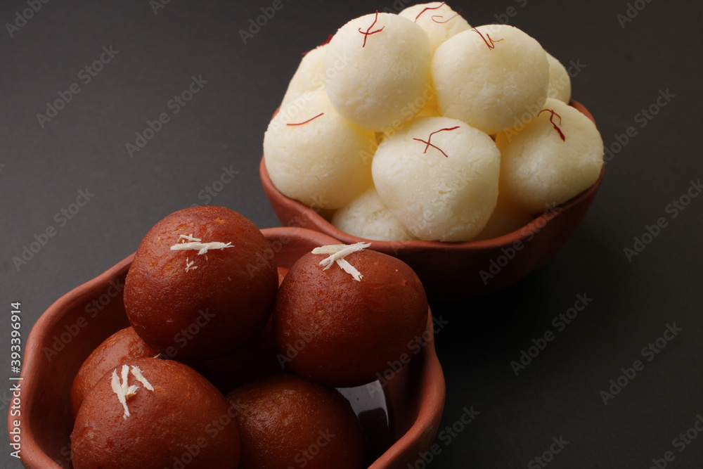 Famous Indian desserts rasgulla/ rosogulla/ roshogulla and gulab jamun ...