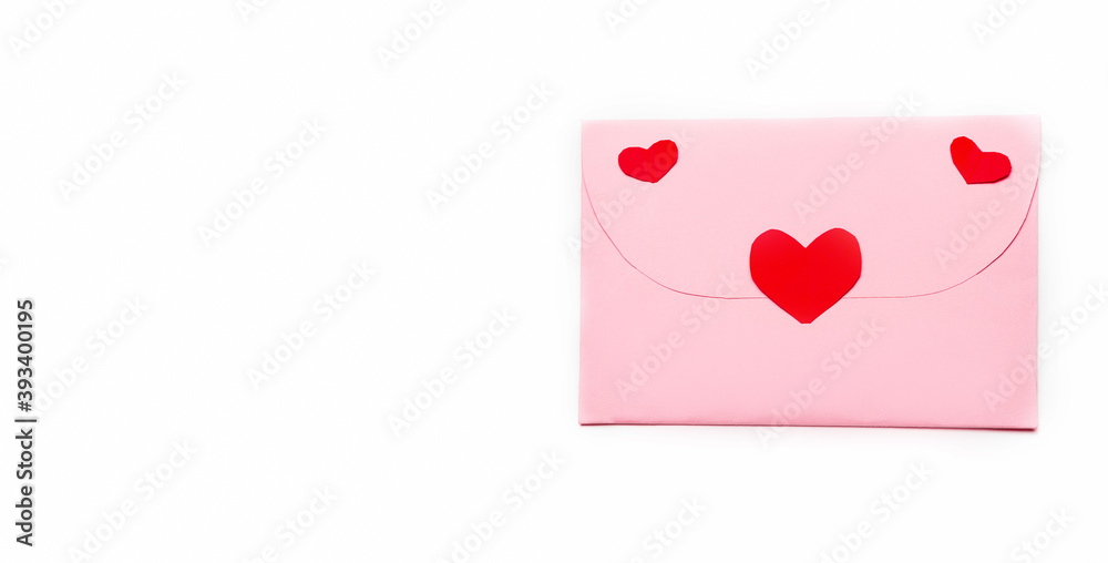 Valentine's Day. Pink an envelopes with heart. Writing a love letter. Message.Top view. copy space. Valentine concept. White background Valentine's Day. Pink an envelopes with heart. Writing a love letter. Message.Top view. copy space. Valentine concept. White background
