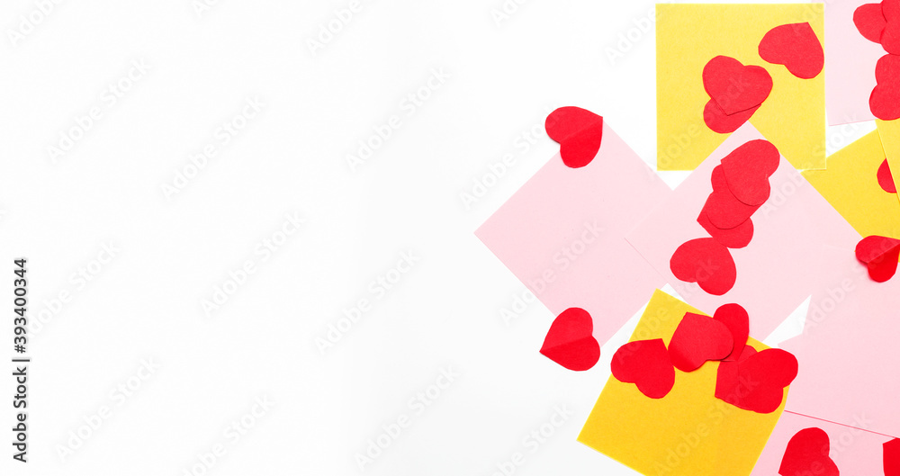 valentines day. blank sheet with cut paper hearts for love message on a white background. copy space