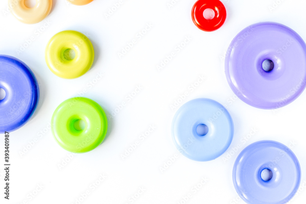Baby accessories and toys on white background top view mock up Baby accessories and toys on white background top view mock up