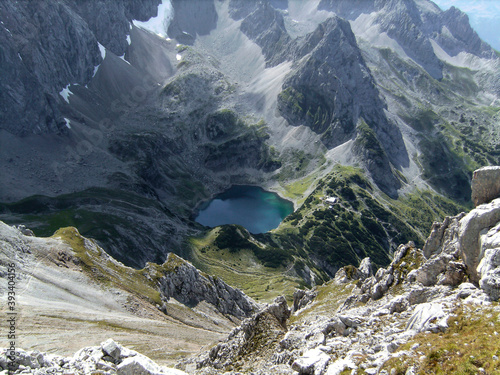 Via ferrata at high mountain lake Drachensee, Tajakante, Tyrol, Austria photo