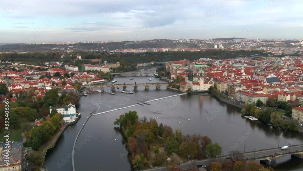 Prague, Czech Republic, aerial view of cityscape showing historical landmark Prague castle and bridges over the Vltava river in autumn season.