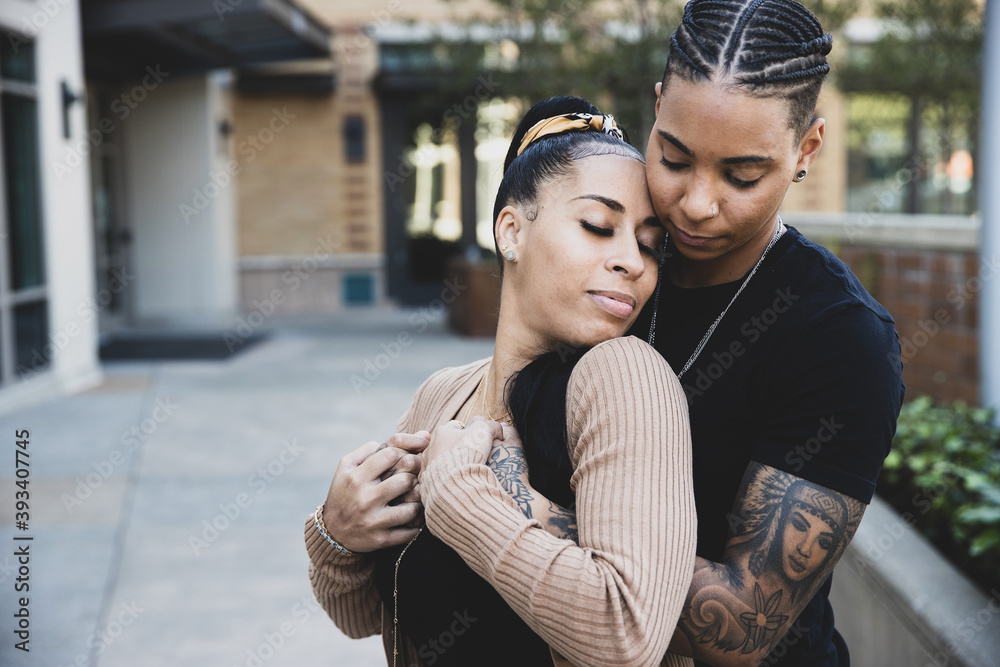 Young African American lesbian couple close together Stock Photo | Adobe  Stock