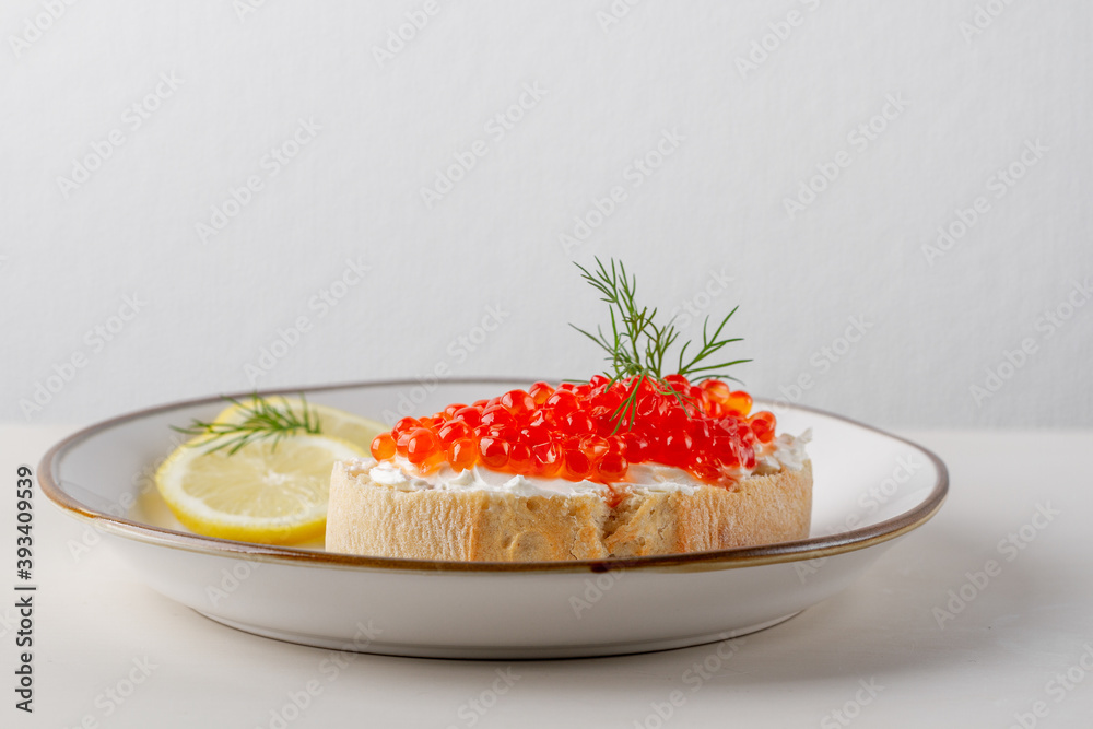 Fresh red caviar on bread. Sandwich with red caviar. Fresh red caviar on bread. Sandwich with red caviar.