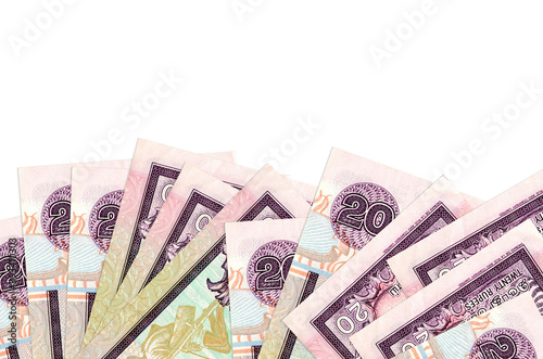 20 Sri Lankan rupees bills lies on bottom side of screen isolated on white background with copy space. Background banner template photo