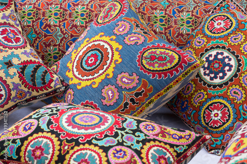 Bright multicolored uzbek pillows close up © Shchipkova Elena