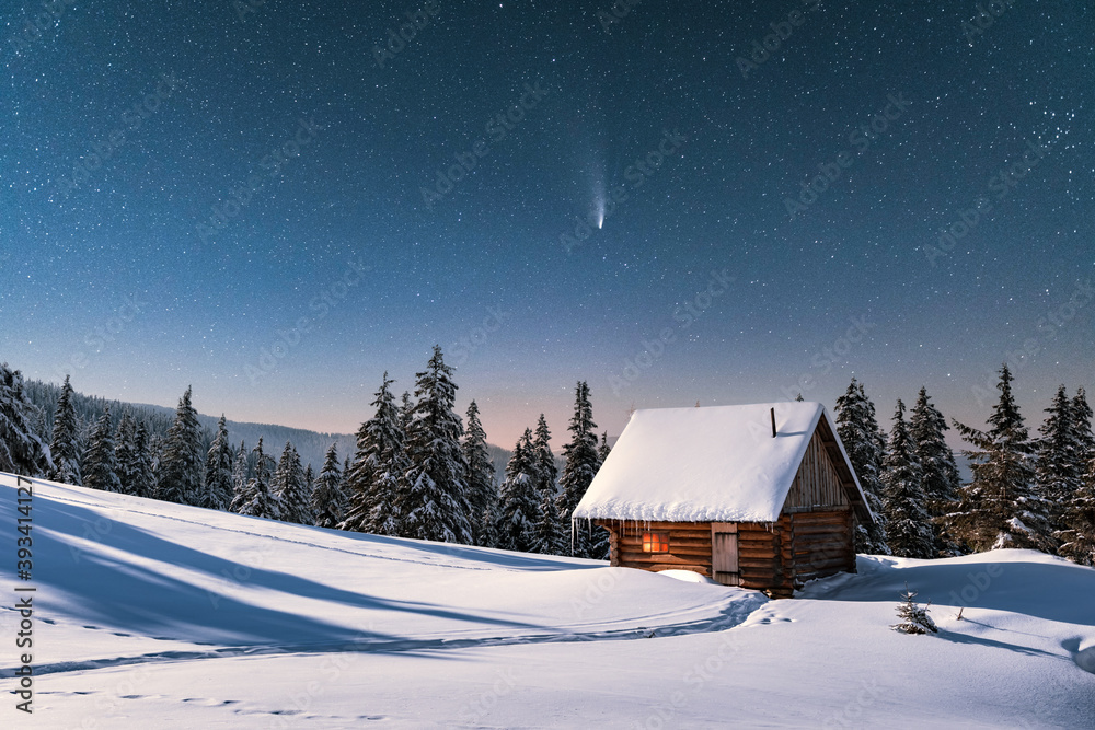 Fototapeta Fantastic winter landscape with wooden house in snowy mountains