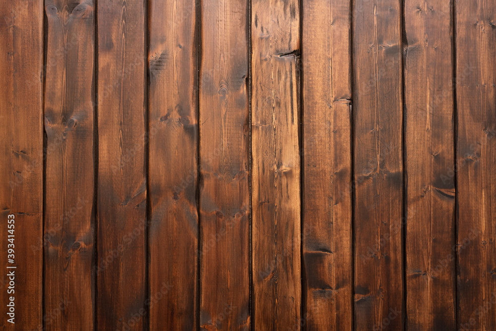 Old brown plank wooden table texture background.
