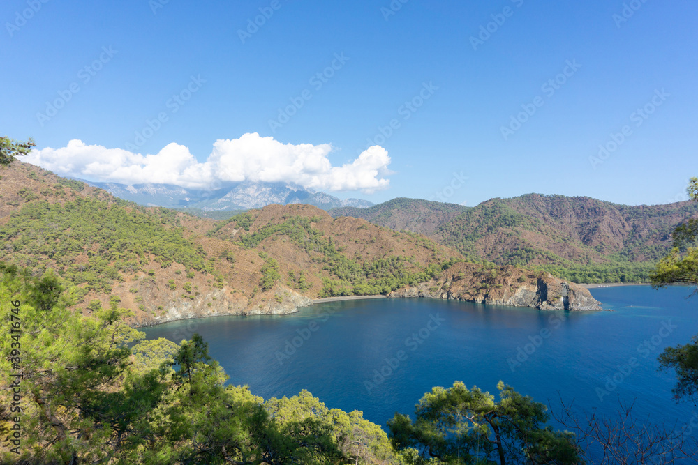 Mediterranean seascape in Turkey. View of a small bay near the Tekirova village, District of Kemer, Antalya Province. Mediterranean seascape in Turkey. View of a small bay near the Tekirova village, District of Kemer, Antalya Province.