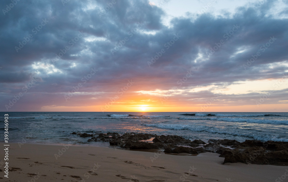 sunset on the beach in Oahu