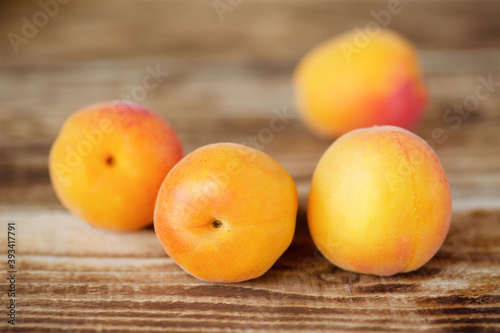 Fruit yellow ripe apricot is on the table.