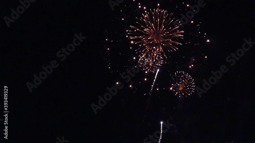 fireworks with bokeh lights in night sky