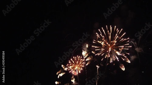 fireworks with bokeh lights in night sky