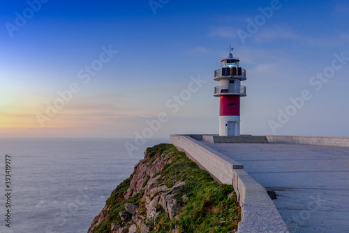 Cabo Ortegal lighthouse on the coast of Galicia at sunset