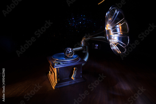 Old gramophone on a dark background. Music concept