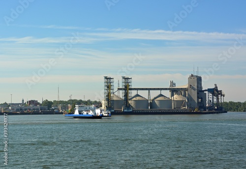 View across the Saint Lawrence river towards the ferry entering the harbor of Sorel Tracy, Quebec Canada