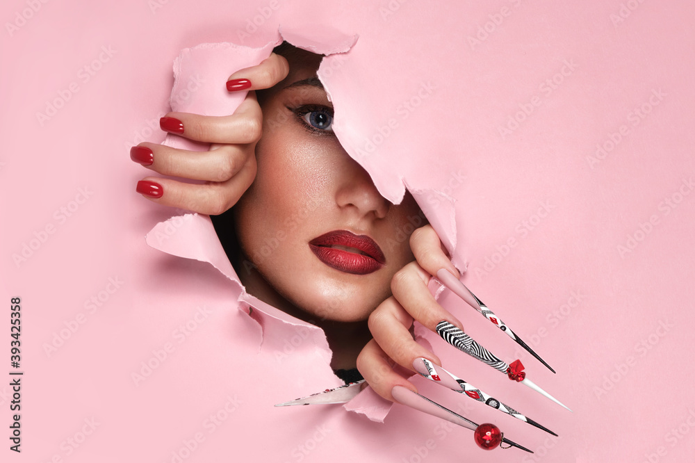 Portrait of a beautiful woman with art make up in glamorous style, creative long nails. Design manicure. Beauty face. - obrazy, fototapety, plakaty 