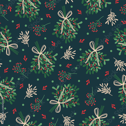 Winter seamless pattern with mistletoe bunches, branches, leaves, berries. Christmas illustration for fabric, wrapping paper, postcard design. Vector background.