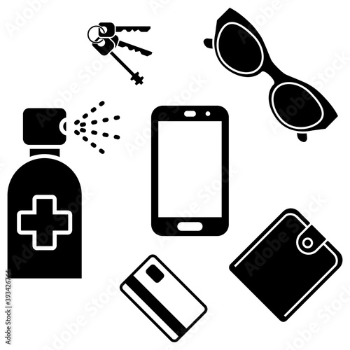 Sanitizer spray for disinfecting phone, wallet, keys, credit card, sunglasses. Sanitizing personal mobile, wallet and keys used disinfectant. Smartphone disinfection. Sterile surface