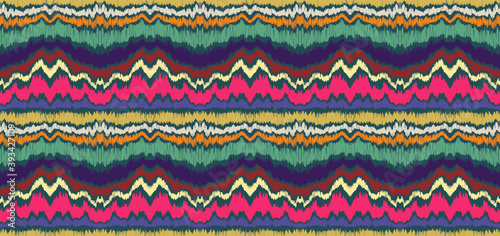 Ikat border. Geometric folk ornament. Ink on clothes. Tribal vector texture. Seamless striped pattern in Aztec style. Ethnic embroidery. Indian, Scandinavian, Gypsy, Mexican, African rug.