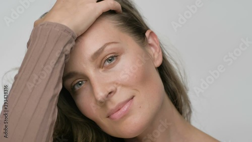 portrait of a flirting and smiling woman