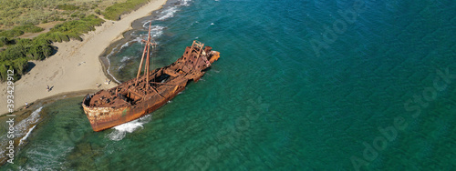 Aerial drone ultra wide photo of famous abandoned old rusty shipwreck of Dimitrios in Selinitsa bay Githeio, Peloponnese, Laconia, Greece