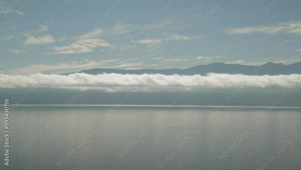 Clouds, sunset, and water make a nice landscape scenery at the Villarrica lake in Chile. The water moves with the sky... Beautiful HD landscape. Clouds, sunset, and water make a nice landscape scenery at the Villarrica lake in Chile. The water moves with the sky... Beautiful HD landscape.
