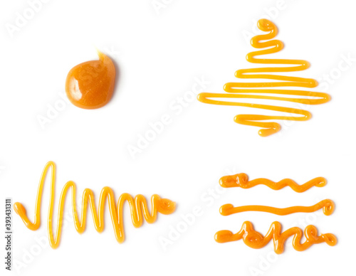 sweet caramel sauce isolated on white background, top view