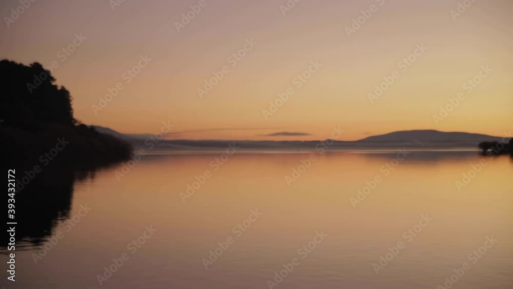 Sunset at Lake Villarrica in Chile makes a beautiful postcard. Sailing, kayaking, sports fishing, and water skiing are popular in the summer and a popular ski resort in the winter. Sunset at Lake Villarrica in Chile makes a beautiful postcard. Sailing, kayaking, sports fishing, and water skiing are popular in the summer and a popular ski resort in the winter.