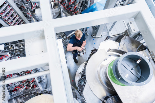 Top view of man working in modern factory