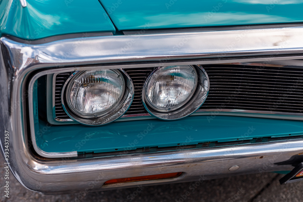 front of the retro car with round lights