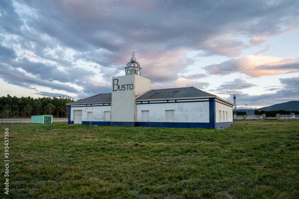 view of the Cabo de Busto lighthouse at sunset view of the Cabo de Busto lighthouse at sunset