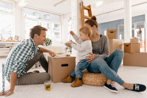 Happy family moving into new home