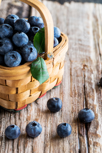 blueberries in  basket on  wooden table