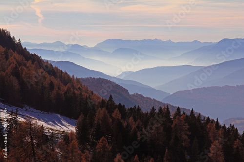 dal Passo di Pampeago; le Dolomiti di Brenta chiudono una suggestiva successione di monti photo