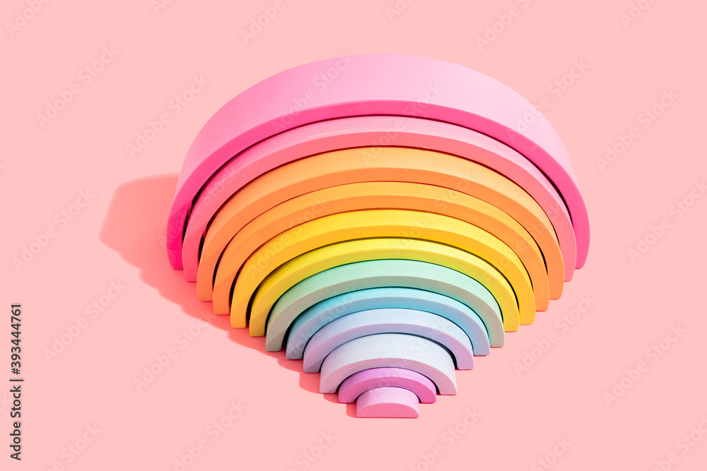 © gemma ferrando & jeremie roman/Westend61 - Close-up of colorful rainbow toy on pink background